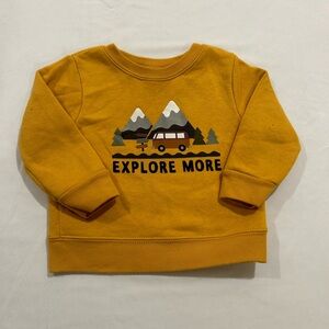 Explore More yellow sweater
